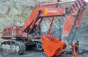 BUCKET FOR HITACHI EX-1200 MINING EXCAVATOR, HAS BEEN SACCESSFULLY OPERATED ON A CAREER